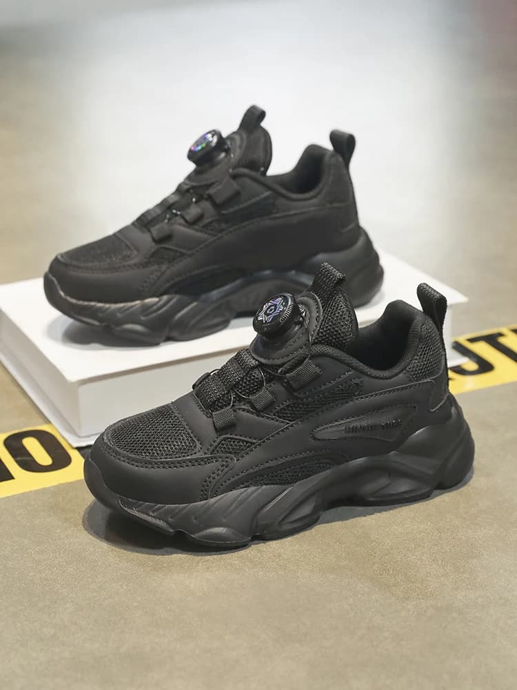 Boucle rotative à enfiler! Chaussures de sport noires en mesh pour enfants, respirantes et anti-chau