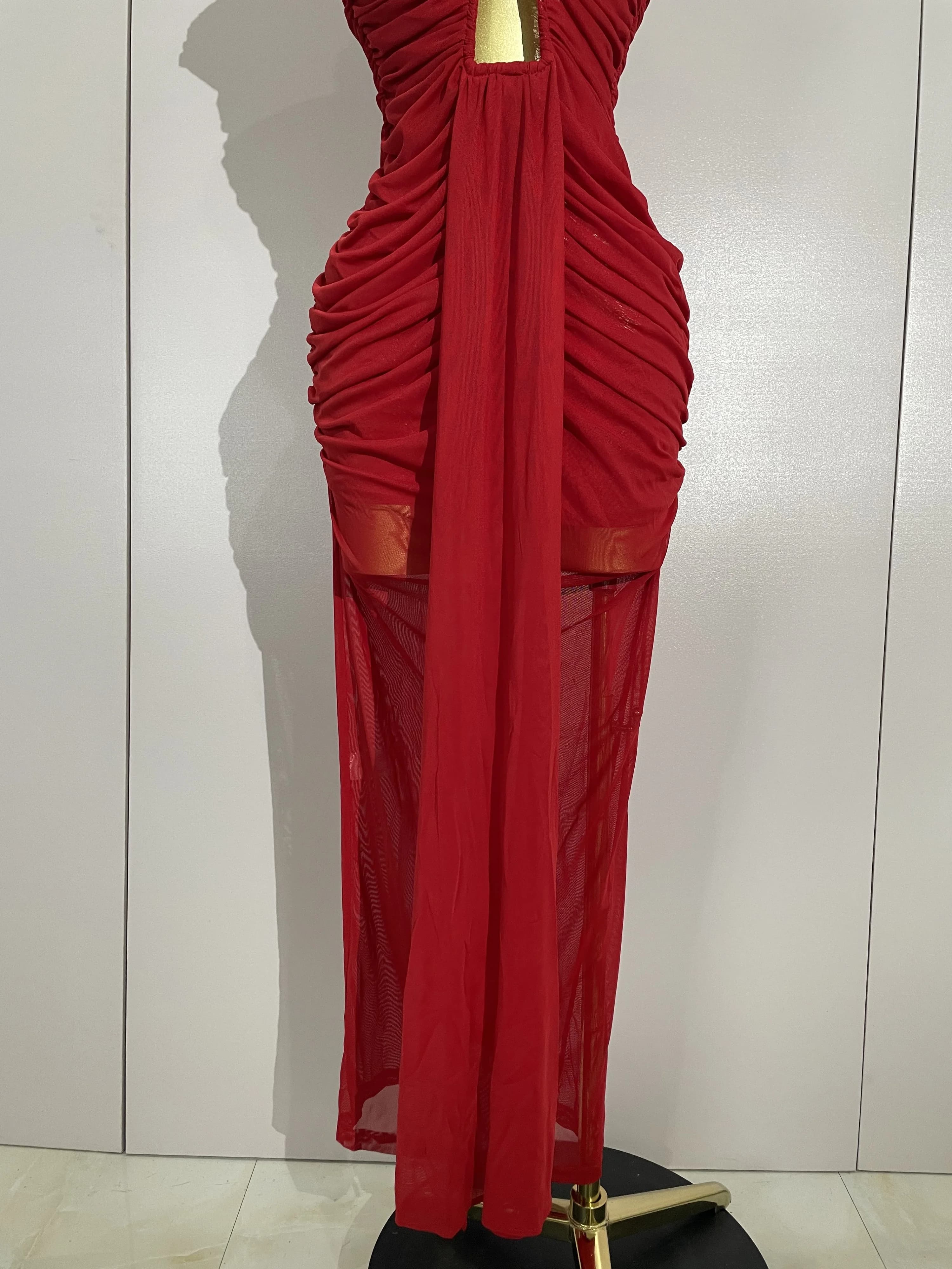 Femmes Sexy sans manches col rond évider maille moulante longue robe défilé de mode célébrer célébri
