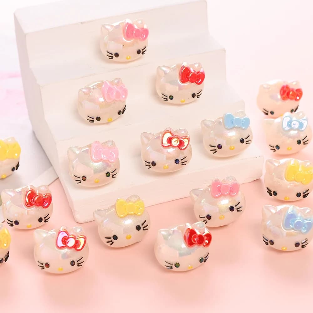 10 pièces mélange aléatoire de perles en résine Hello Kitty tête Focus perle pour bébé dentition suc