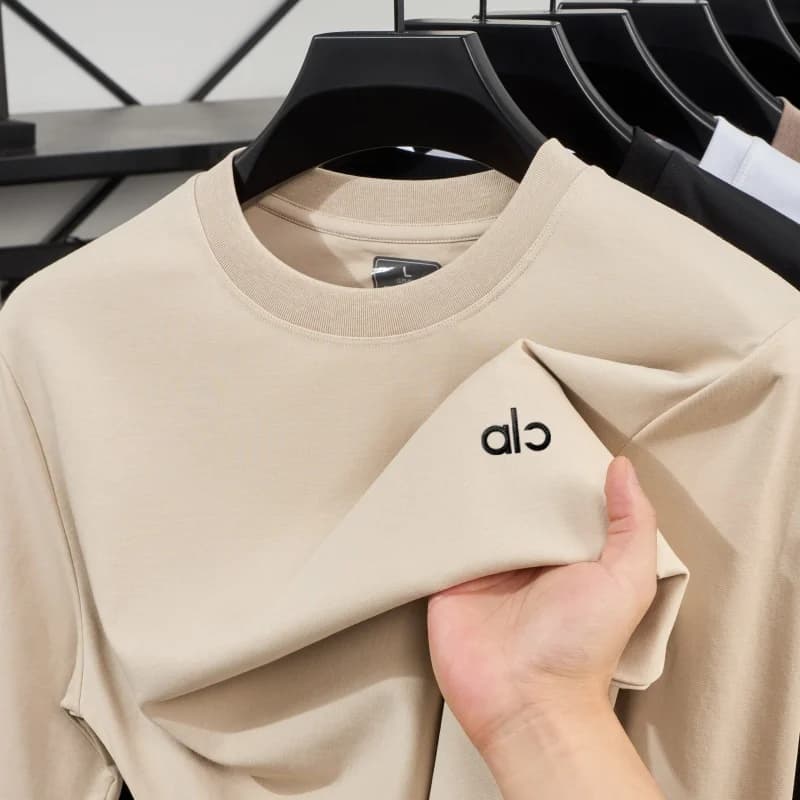 T-shirt à col rond pour homme, nouvelle collection automne, marque de mode haut de gamme, avec badge