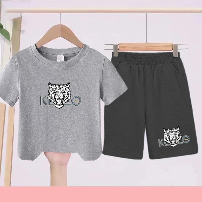 T-shirts d'été noirs et blancs pour enfants, associés à des tenues de sport respirantes et à séchage