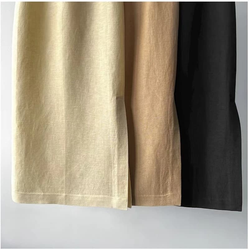 Jupe simple taille haute en lin et laine, atmosphère artistique espagnole, ourlet texturé, fente lat