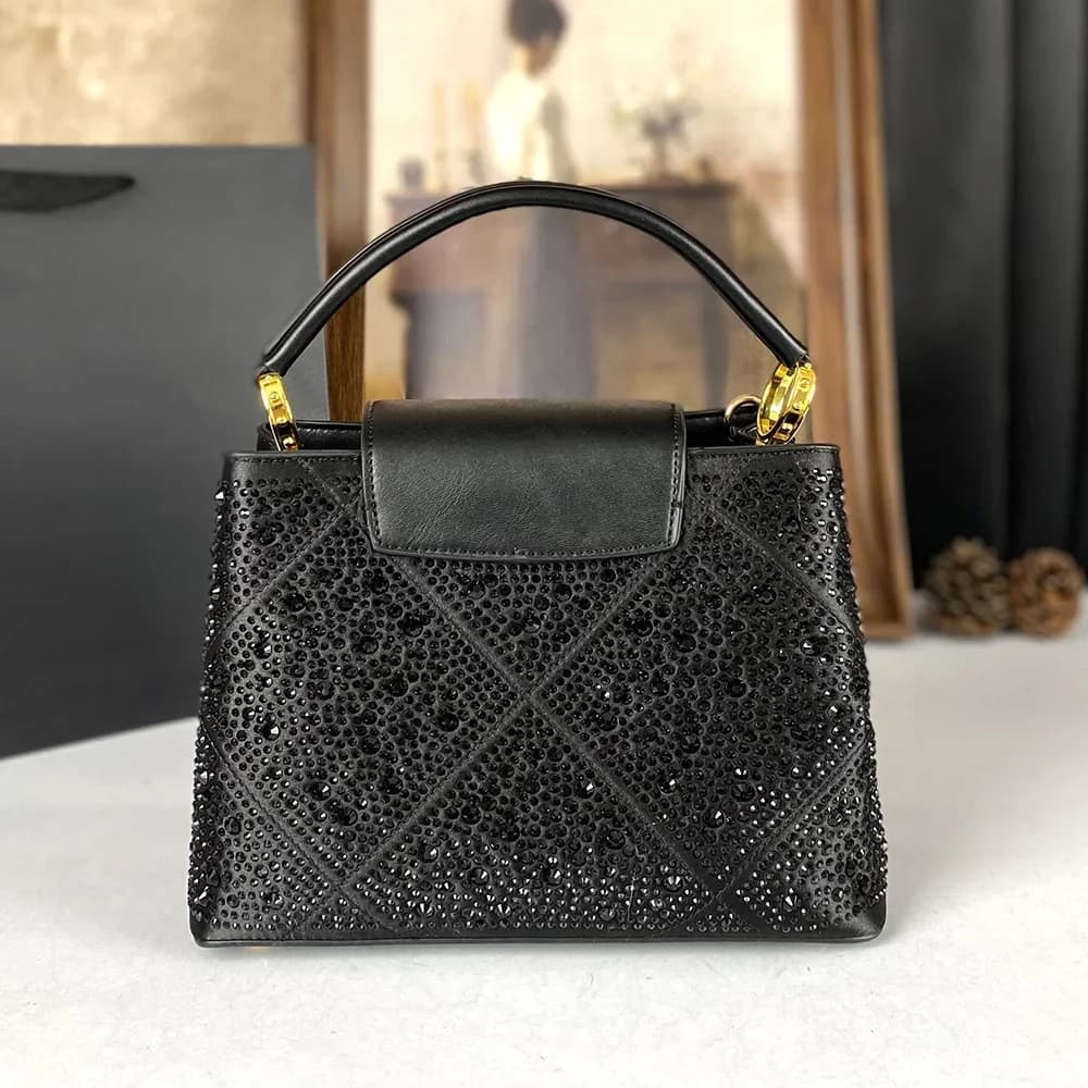 Brillant diamant Style sac à main 2025 nouveau sac pour femmes européennes et américaines Rivet eau 