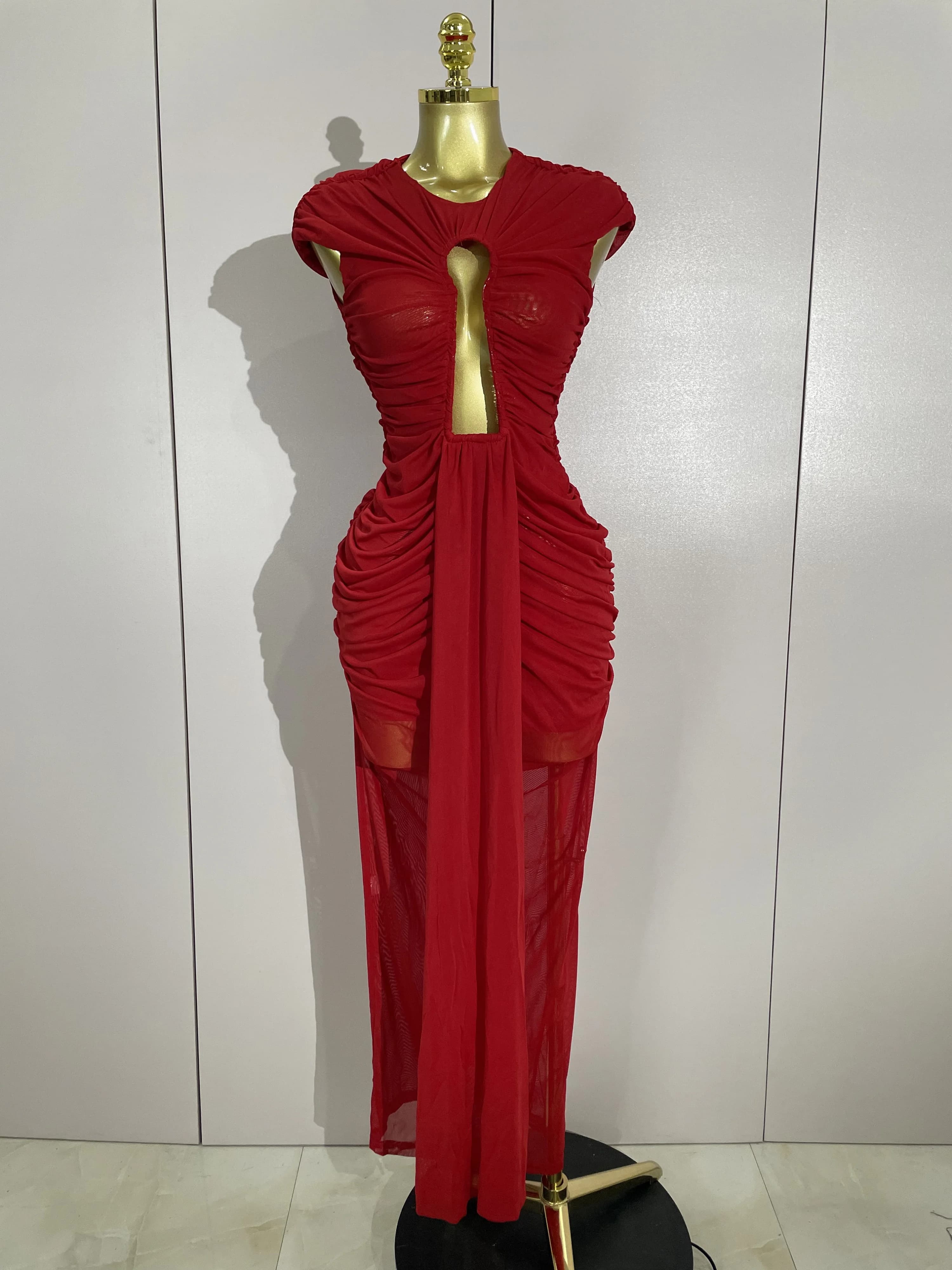 Femmes Sexy sans manches col rond évider maille moulante longue robe défilé de mode célébrer célébri