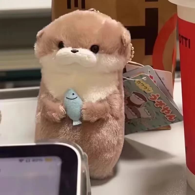 Mignon petite loutre câlin poisson en peluche poupée pendentif poupée cadeau mignon fille coeur port