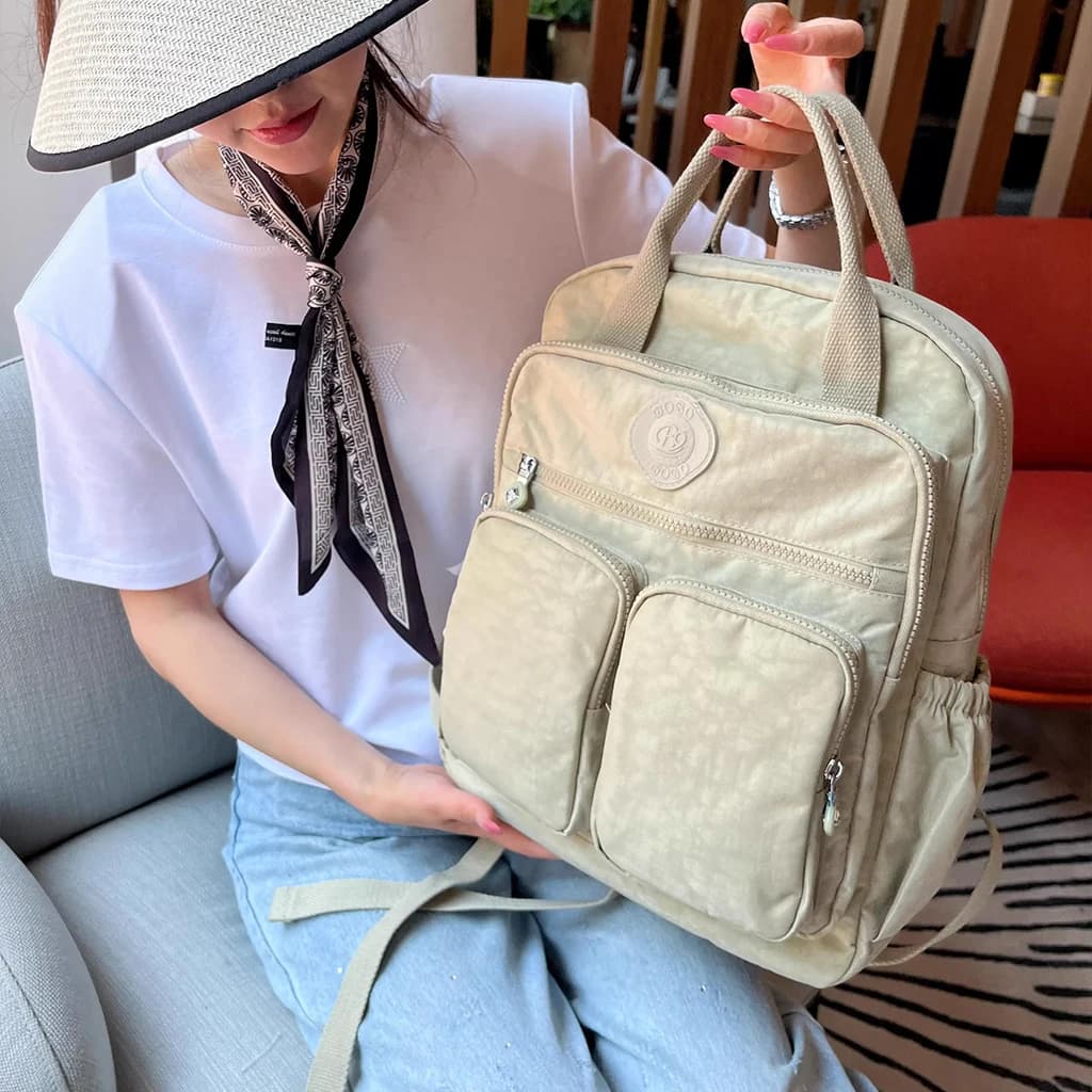Sac à dos multi-poches pour femmes, sac à dos de voyage en Nylon de couleur unie à poignée souple, l