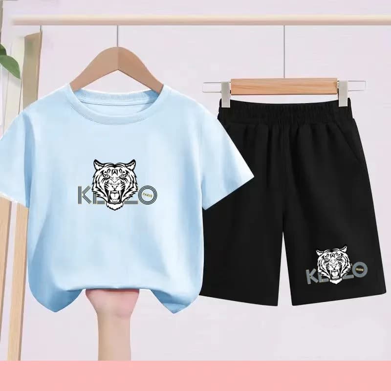 T-shirts d'été noirs et blancs pour enfants, associés à des tenues de sport respirantes et à séchage