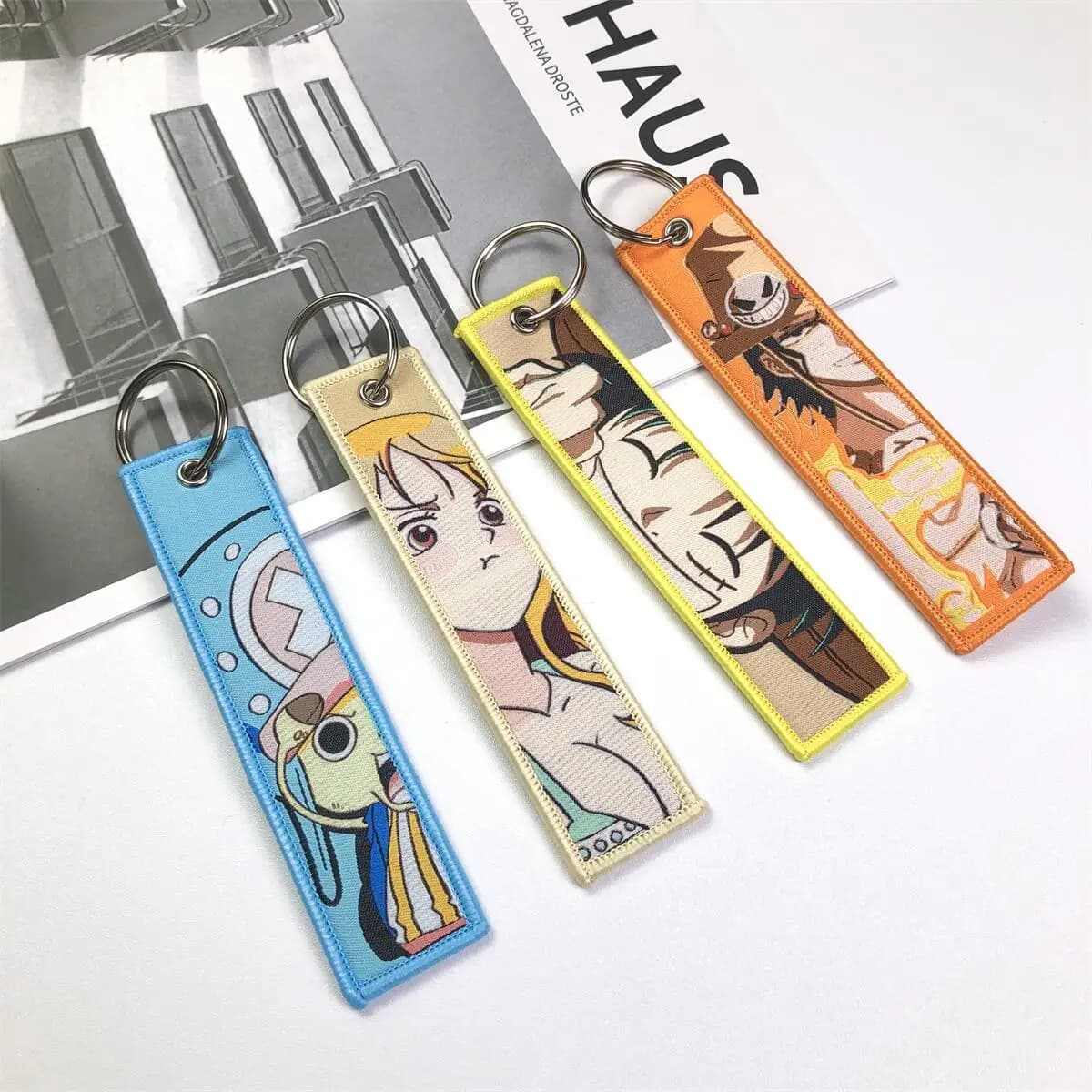 Porte-clés Anime une pièce avec mignon Jet Manga brodé, étiquette de clé à la mode pour accessoire d