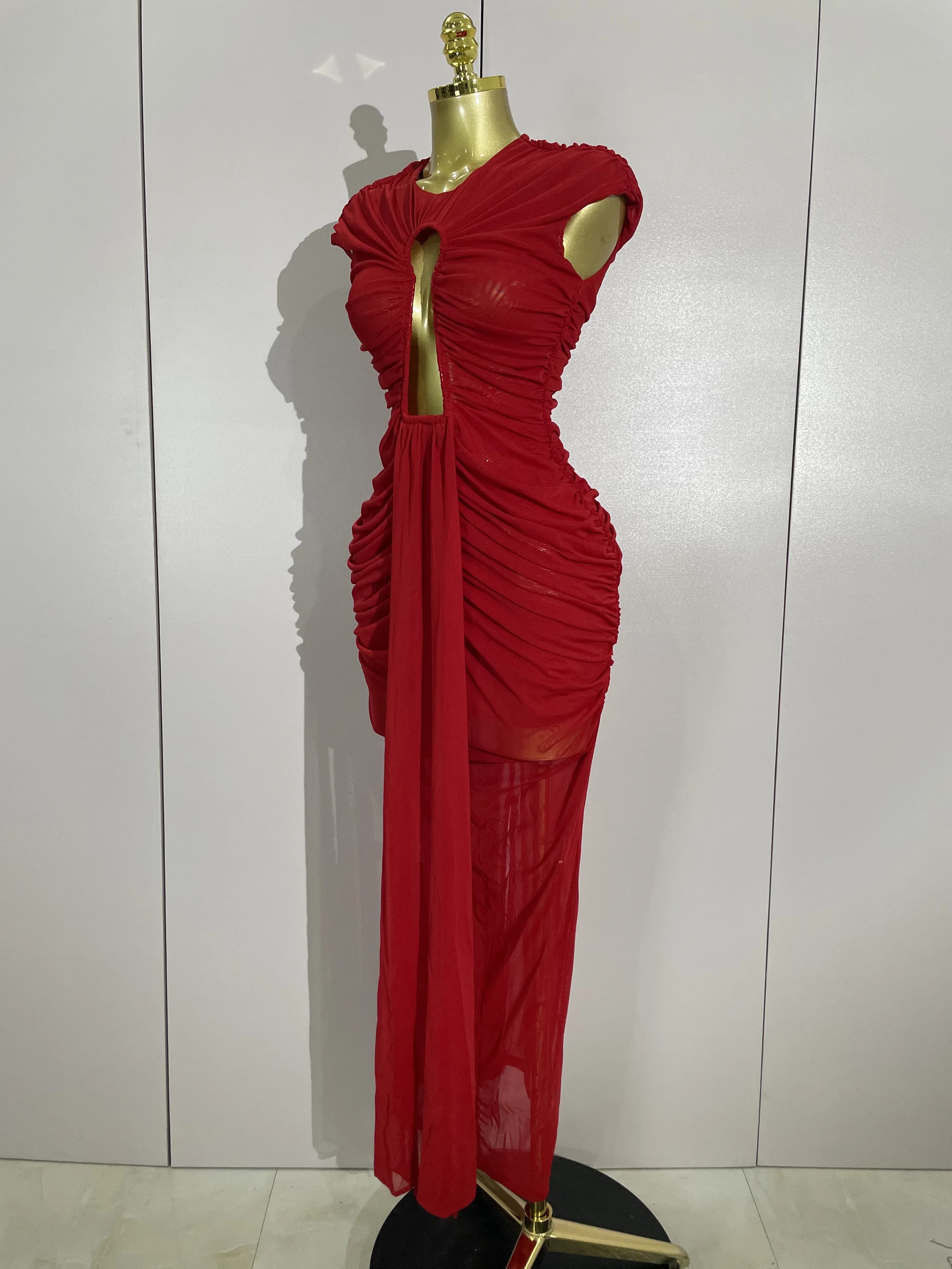 Femmes Sexy sans manches col rond évider maille moulante longue robe défilé de mode célébrer célébri