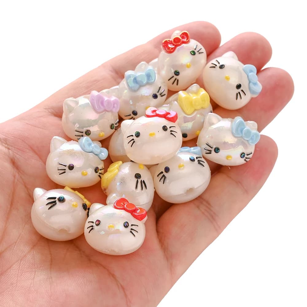 10 pièces mélange aléatoire de perles en résine Hello Kitty tête Focus perle pour bébé dentition suc