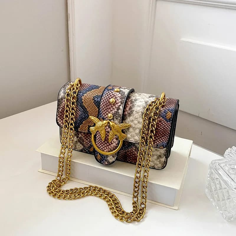 Sac à bandoulière tendance pour femme avec chaîne et blocs de couleur, sac à main élégant à porter s