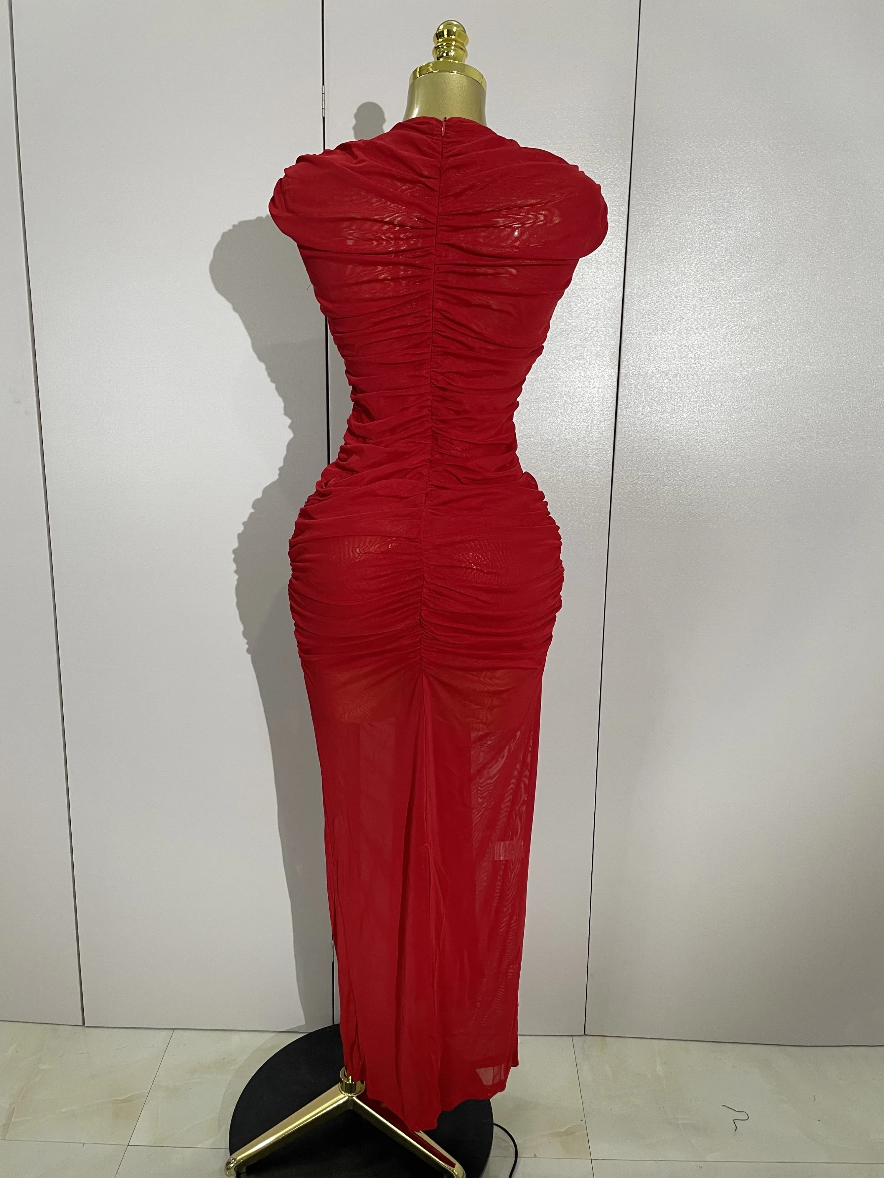 Femmes Sexy sans manches col rond évider maille moulante longue robe défilé de mode célébrer célébri