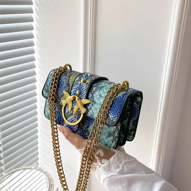 Sac à bandoulière tendance pour femme avec chaîne et blocs de couleur, sac à main élégant à porter s