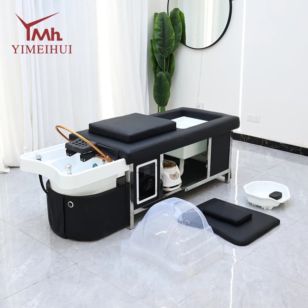 Lit de massage thaïlandais de luxe 2-en-1 noir pour salon et spa avec baignoire pour les pieds intég